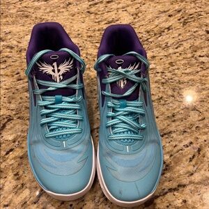 Men’s PUMA M.E.L.O. Basketball Shoes. Worn indoors only.